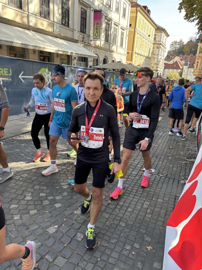father and son completing half marathon through discipline and consistent training