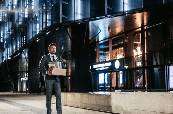 Founder leaving the office after realizing personal identity must change for future growth
